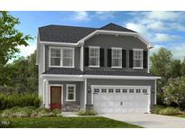 Two-story house with gray siding, white garage door, and red front door at 166 Blue Butterfly Dr, Angier, NC 27501
