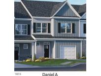 Two-story townhome with gray siding and white trim at 2203 Carcillar Dr, Apex, NC 27539