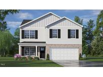 Two-story house with white siding, black shutters, and a two-car garage at 900 Canis Minor Rd, Wendell, NC 27591