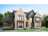 Modern two-story home with mixed siding, large windows, and a two-car garage at 5001 Rampart St, Raleigh, NC 27609