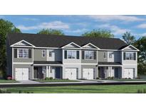 Attractive two-story townhome with a double garage and landscaped front yard at 466 Belgian Red Way, Wake Forest, NC 27587