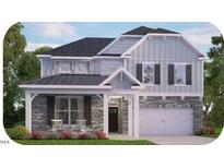 Two-story house with gray siding, stone accents, and a covered porch at 7561 Percussion Dr, Apex, NC 27539