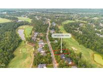 Aerial view of a lot available in a golf course community at 684 Golfers Vw, Pittsboro, NC 27312