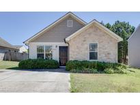 Charming one-story home with stone and siding accents at 1732 Great Bend Dr, Durham, NC 27704