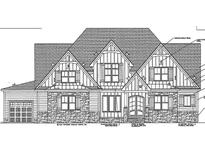 Two-story craftsman style home with stone accents and a large front porch at 1220 Perry Bluff Dr, Wake Forest, NC 27587