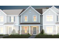 Two-story townhome with gray siding, brick accents, and landscaping at 393 Fosterton Cottage Way, Raleigh, NC 27603