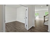 Bright home office features wood-look flooring and french doors at 1230 Middlecrest Dr, Rocky Mount, NC 27804