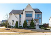 Two-story home with white siding, gray accents, and landscaping at 1816 Center Ridge Dr, Apex, NC 27502