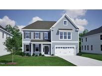 Two-story house with gray siding, white trim, and a two-car garage at 123 Hemlock Falls Trl # 187, Raleigh, NC 27603
