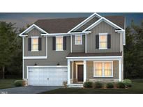 Two-story house with gray siding, white trim, and a two-car garage at 773 Denburn Pl, Raleigh, NC 27603