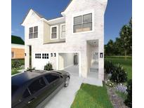 Two story house with a two-car garage at 2709 Fayetteville St, Durham, NC 27707