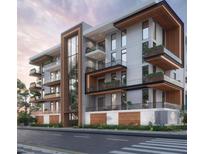 Modern apartment building with wood and glass accents at 600 N Roxboro St # 44, Durham, NC 27701