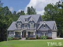 Two story craftsman style home with three car garage at 7433 Guess Rd, Hillsborough, NC 27278
