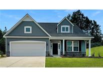 Gray siding two story home with a double car garage at 34 Waverly (Lot 403) Way, Cameron, NC 28326