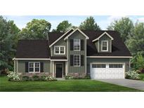 Two-story house with gray siding, stone accents, and a two-car garage at 553 Solomon Dr, Cameron, NC 28326