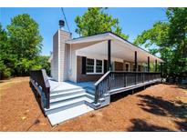 Charming single-story home with covered front porch and updated siding at 6663 Nc 56 Hwy, Franklinton, NC 27525