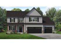 Two-story home with gray siding, black trim, and a two-car garage at 180 Edes Ct, Cameron, NC 28326