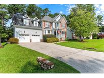 Two-story house with stone and siding at 367 Falling Water Rd, Spring Lake, NC 28390