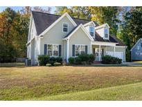 Two story house with a well maintained lawn at 150 Carrington Ave, Franklinton, NC 27525