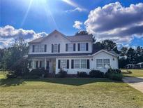 Two-story house with a spacious lawn and a driveway at 1009 Bittbourg Ln, Wendell, NC 27591