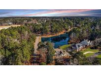 Luxury home community with pond and lush landscaping at 2648 Buckingham Dr, Sanford, NC 27330