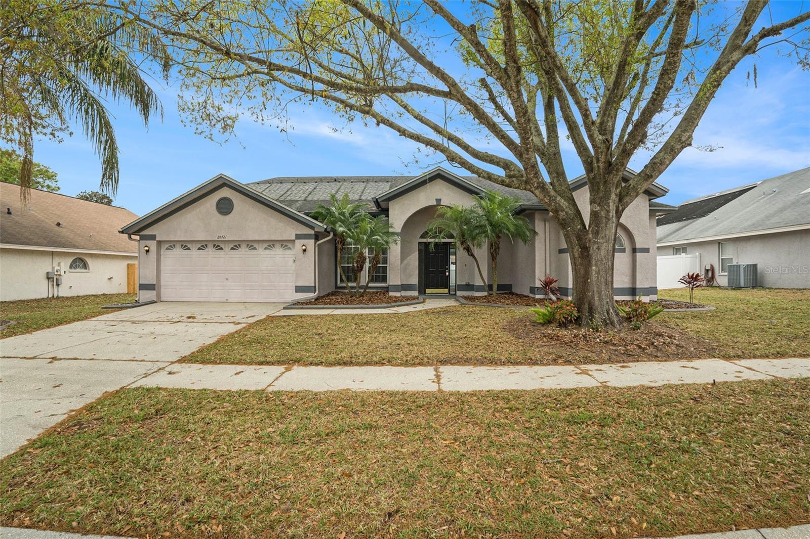 Photo one of 28721 Cottagewood Dr Wesley Chapel FL 33545 | MLS O6184590