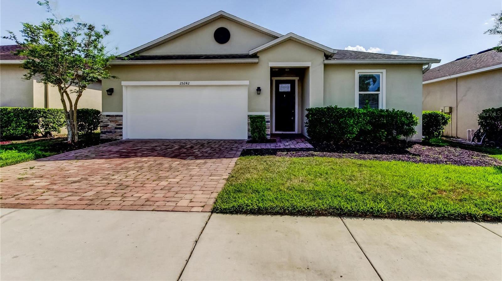 Photo one of 25242 Carnation Sedge Way Land O Lakes FL 34639 | MLS O6298354