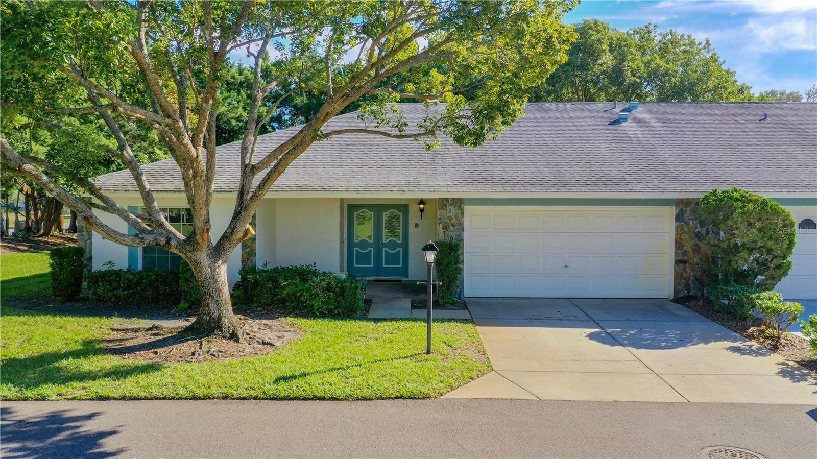 Photo one of 10901 Sandtrap Dr Port Richey FL 34668 | MLS T3491232