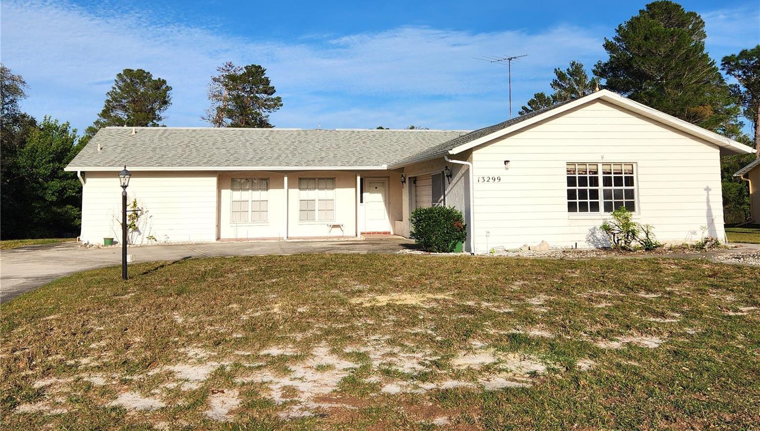 Photo one of 13299 Drayton Dr Spring Hill FL 34609 | MLS T3496656
