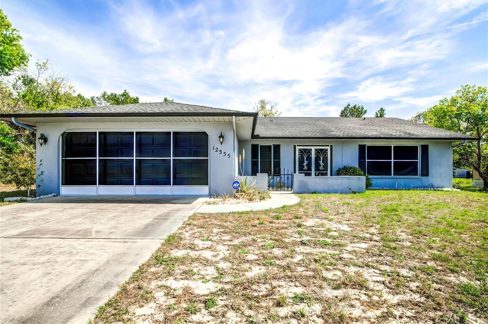 Photo one of 12555 Brookside St Spring Hill FL 34609 | MLS T3512121