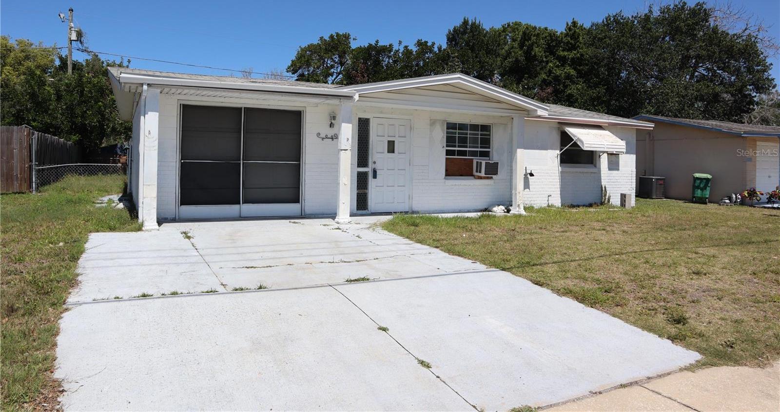Photo one of 5025 State Road 54 New Port Richey FL 34652 | MLS T3515368