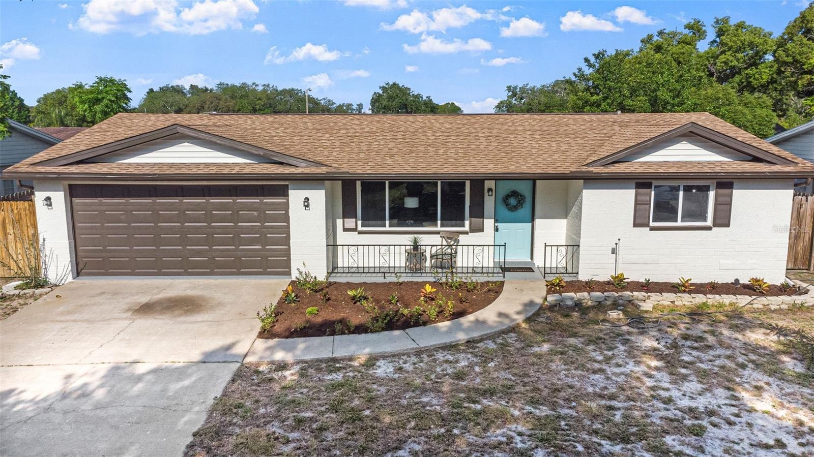 Photo one of 8923 Windsong Ln Port Richey FL 34668 | MLS T3521324