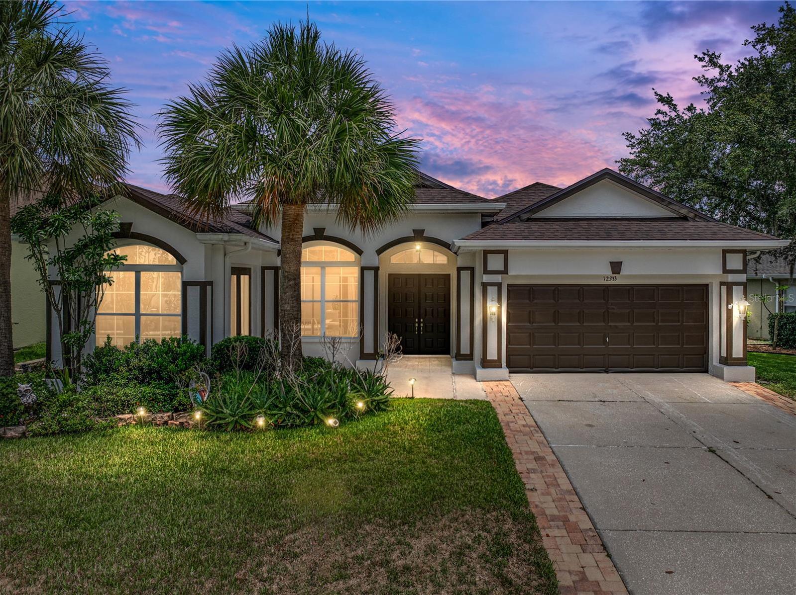 Photo one of 12333 Woodlands Cir Dade City FL 33525 | MLS TB8350297