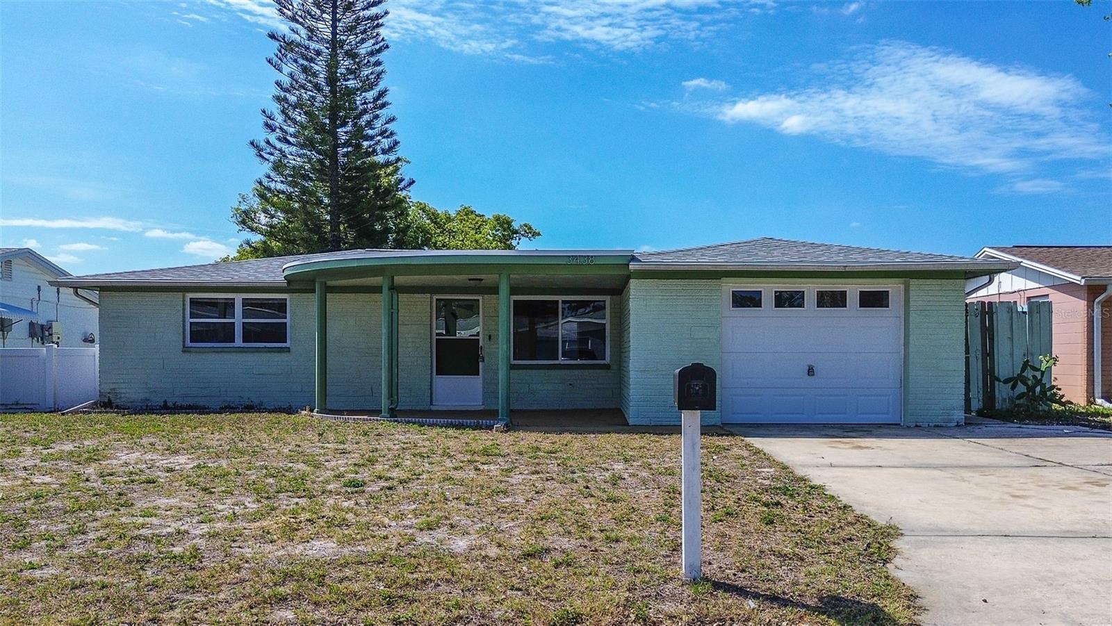 Photo one of 3438 Bigelow Dr Holiday FL 34691 | MLS TB8359757