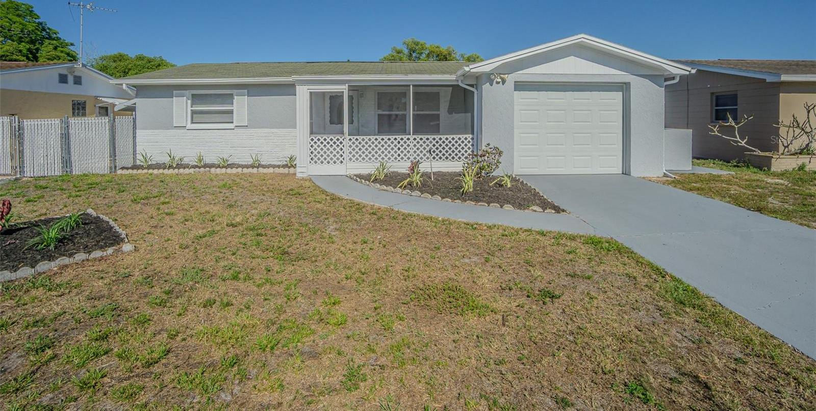 Photo one of 1264 Chelsea Ln Holiday FL 34691 | MLS TB8375469