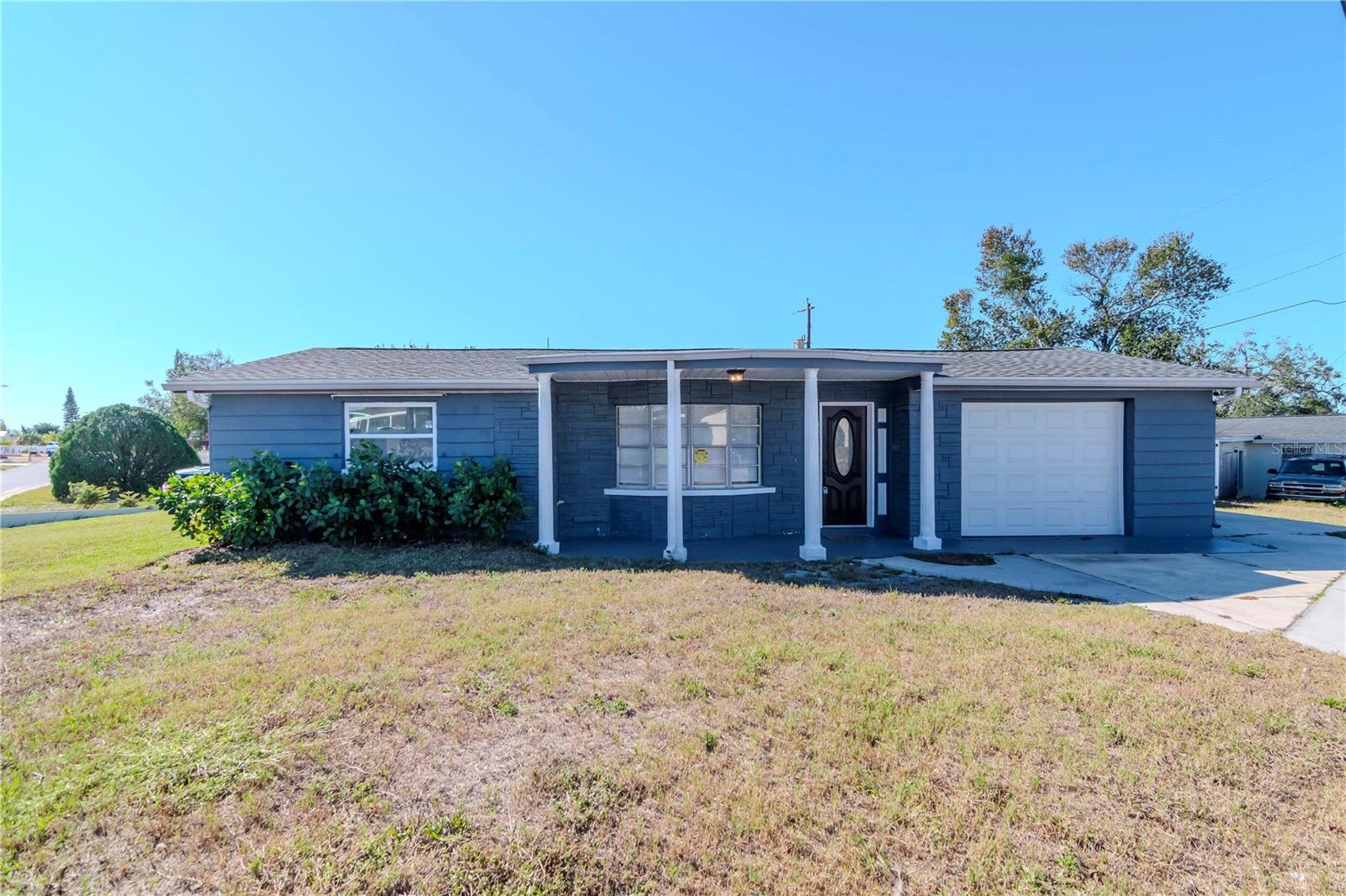 Photo one of 3445 Briar Cliff Dr Holiday FL 34691 | MLS TB8378679