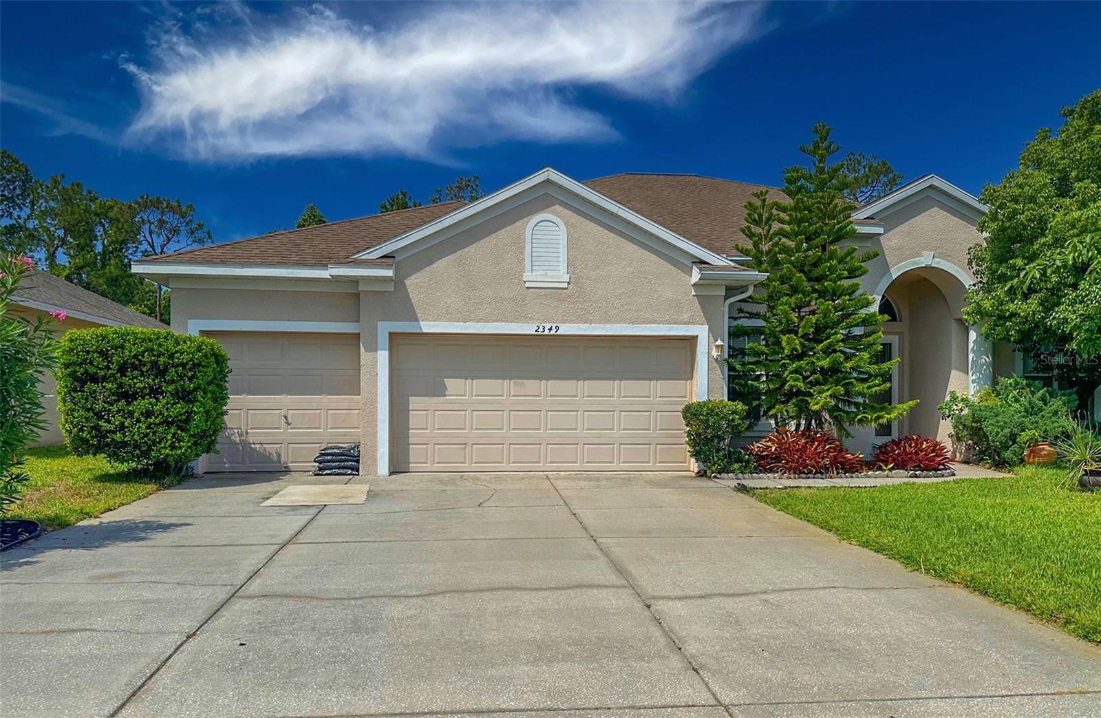 Photo one of 2349 Wood Pointe Dr Holiday FL 34691 | MLS TB8384821