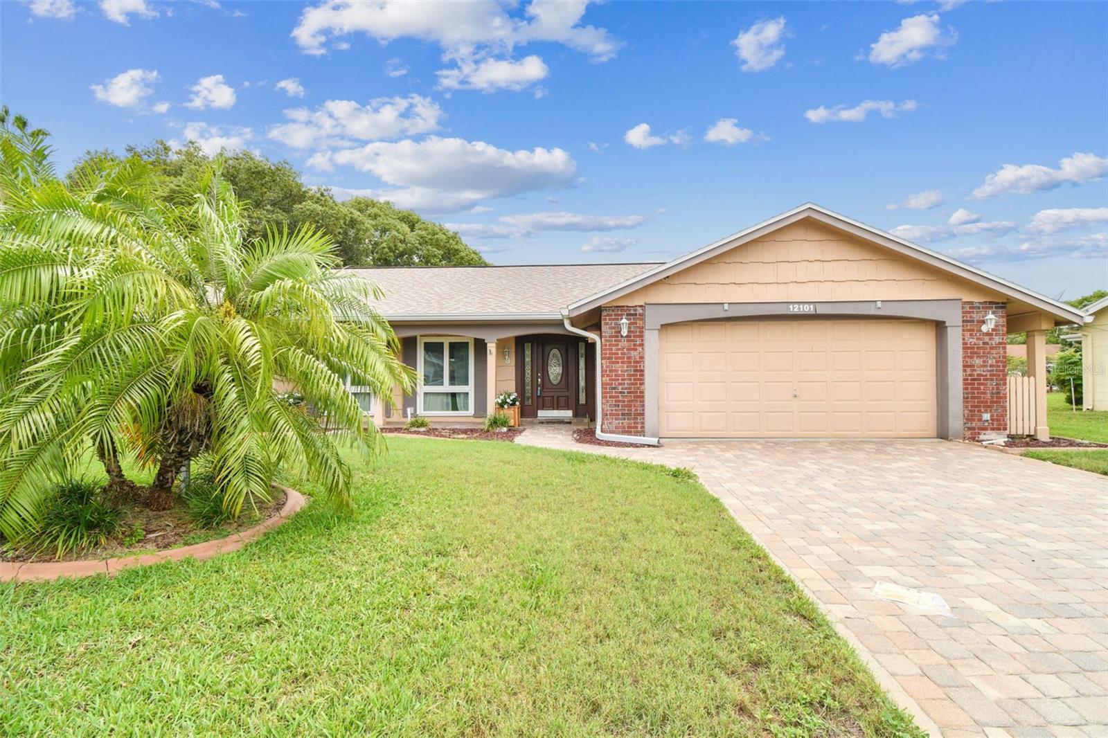 Photo one of 12101 Meadowbrook Ln Hudson FL 34667 | MLS TB8393774