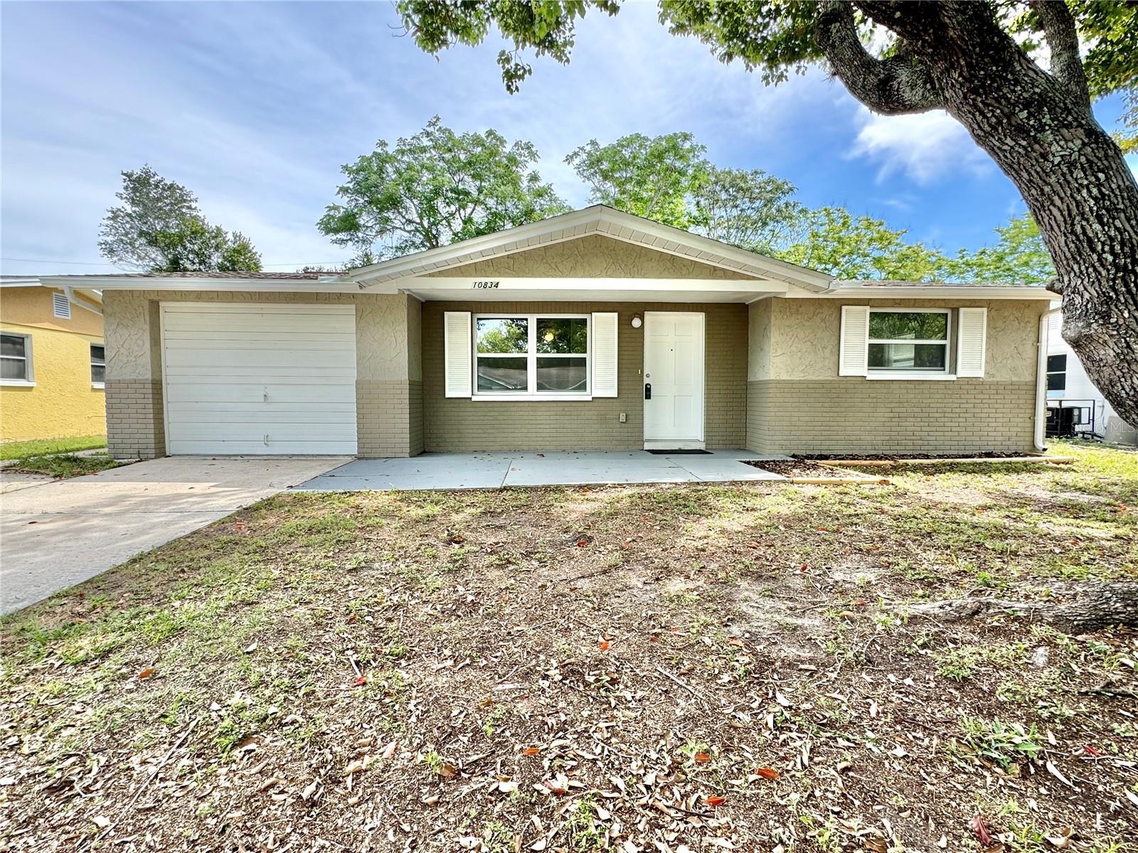 Photo one of 10834 Premier Ave Port Richey FL 34668 | MLS U8236240