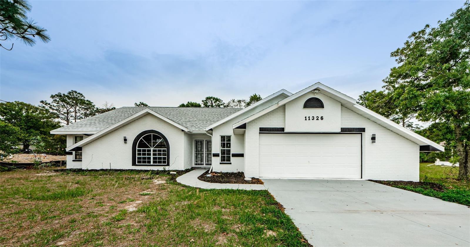 Photo one of 11326 Outrigger Ave Spring Hill FL 34608 | MLS U8236288