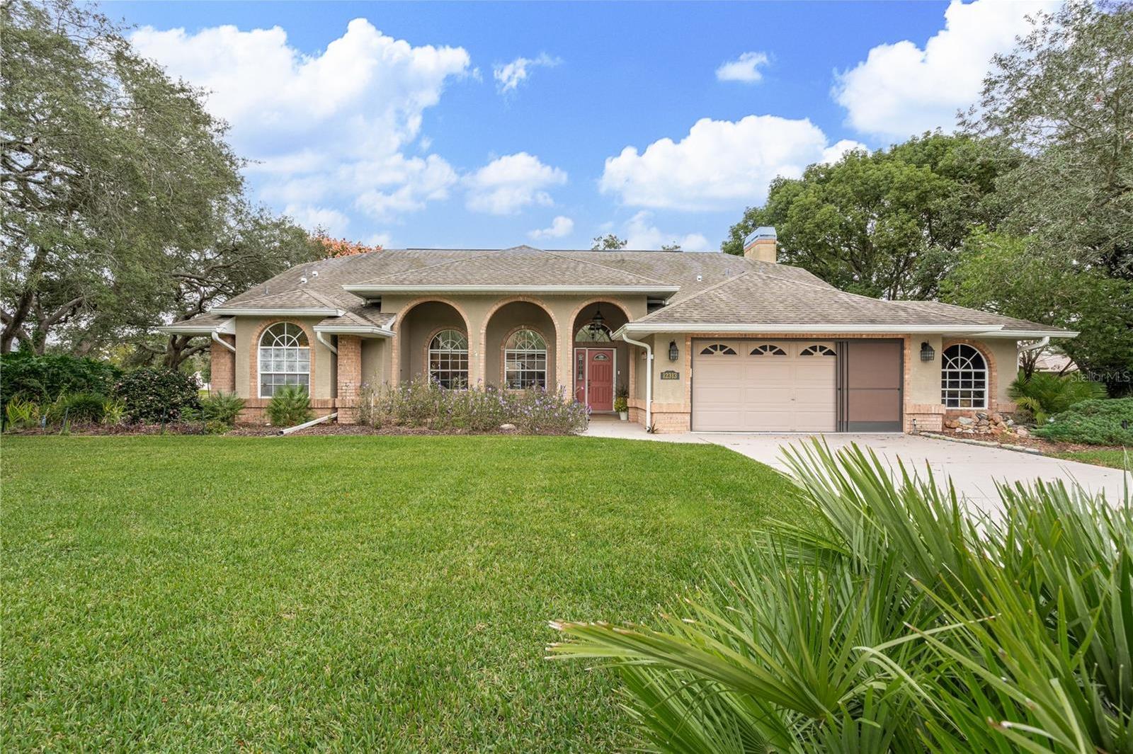 Photo one of 12313 Knotty Pine Ct Spring Hill FL 34609 | MLS W7859756