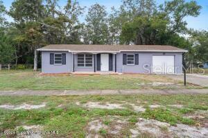 Photo one of 4499 Lakeshore Ave Spring Hill FL 34606 | MLS W7861268