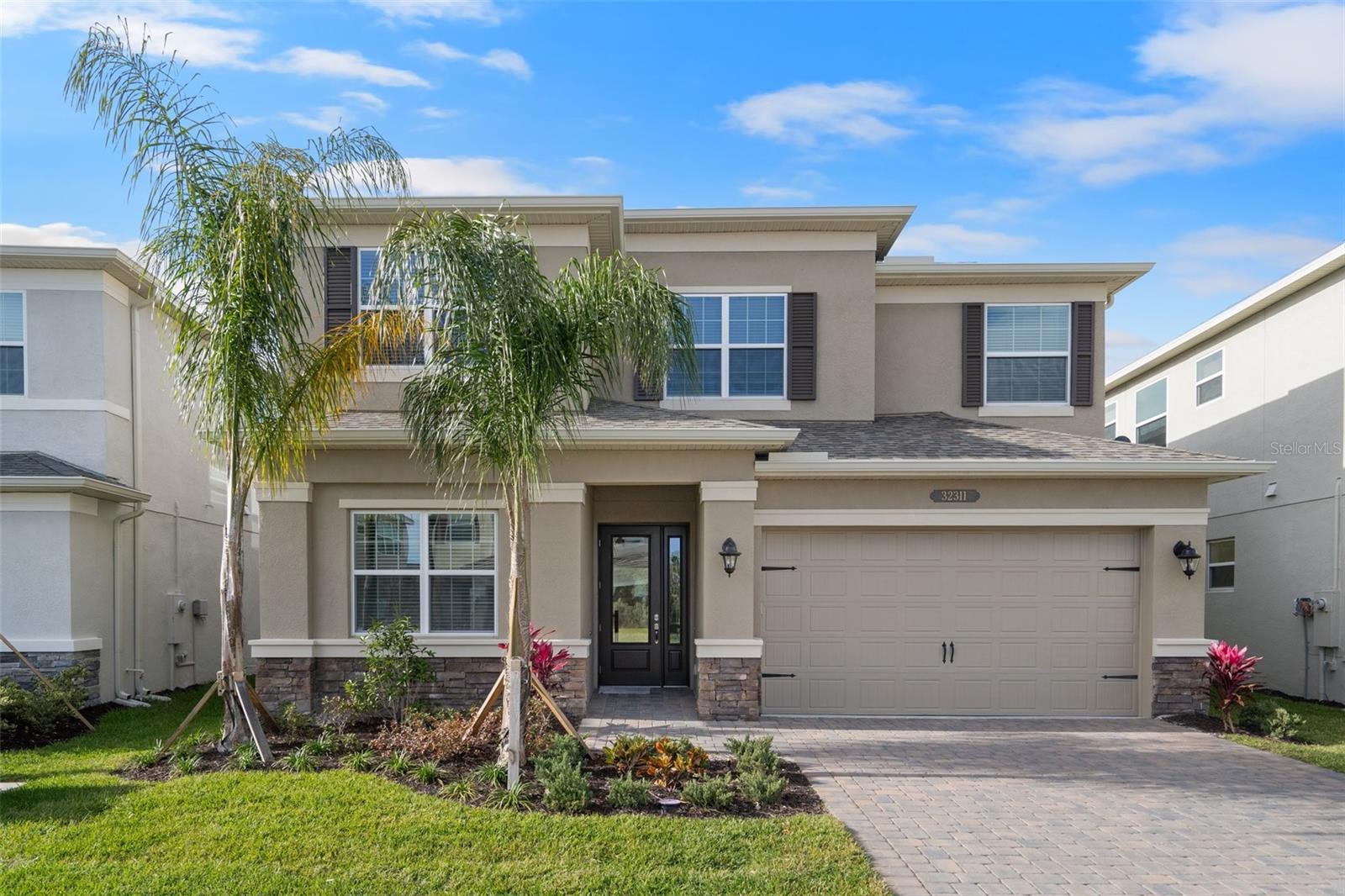 Photo one of 32311 Mahogany Valley Dr Wesley Chapel FL 33543 | MLS W7862226