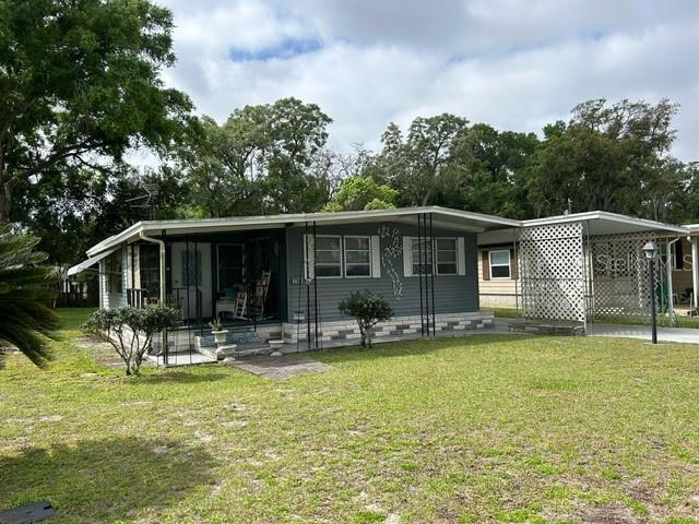 Photo one of 37306 Lois Ave Zephyrhills FL 33542 | MLS W7863114