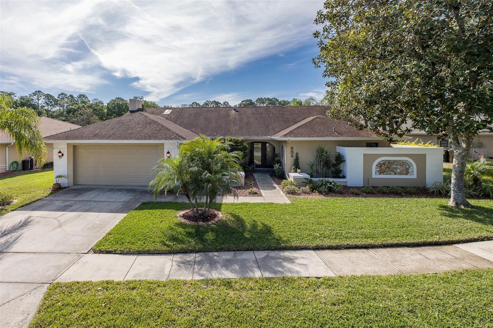 Photo one of 8930 Brooker Dr New Port Richey FL 34655 | MLS W7863491