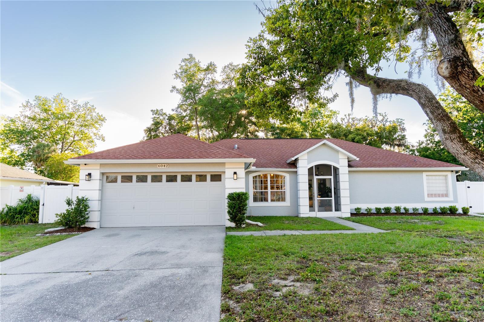 Photo one of 6042 Canopy Oaks Ct New Port Richey FL 34653 | MLS W7863949