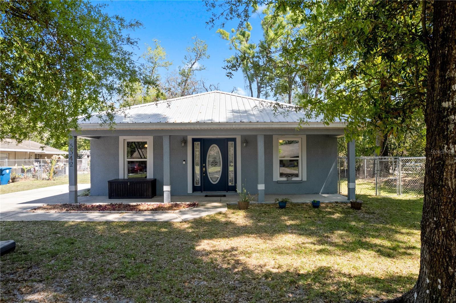 Photo one of 5342 Leisure St Dade City FL 33523 | MLS W7874181