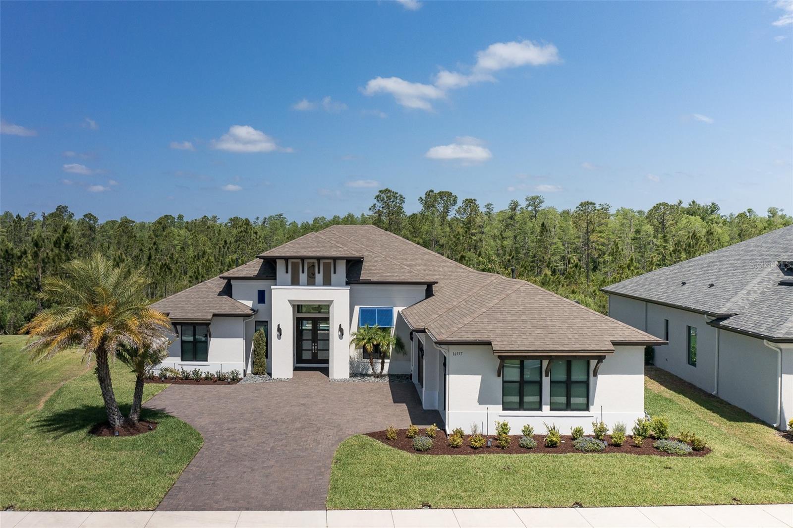 Photo one of 16557 Acoustic Loop Land O Lakes FL 34638 | MLS W7874938