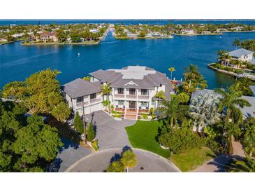 Luxury waterfront home with a private dock and expansive views at 535 70Th St, Holmes Beach, FL 34217