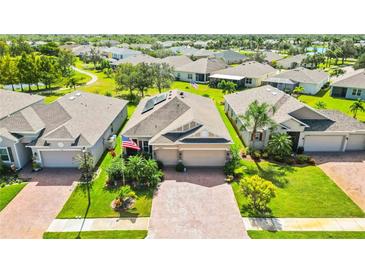 Bird's eye view of a house in a neighborhood at 27855 Arrowhead Cir, Punta Gorda, FL 33982